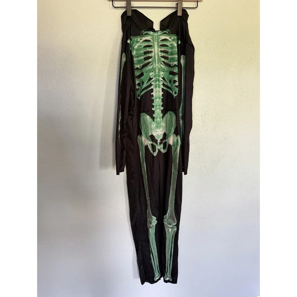 Halloween glow-in-the-dark skeleton costume in size medium (8–10) JUMPSUIT ONLY